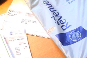 Ash is doing the most boring thing that he has to do every year - his tax return