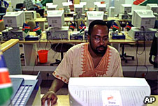 Computer user in Africa, AP