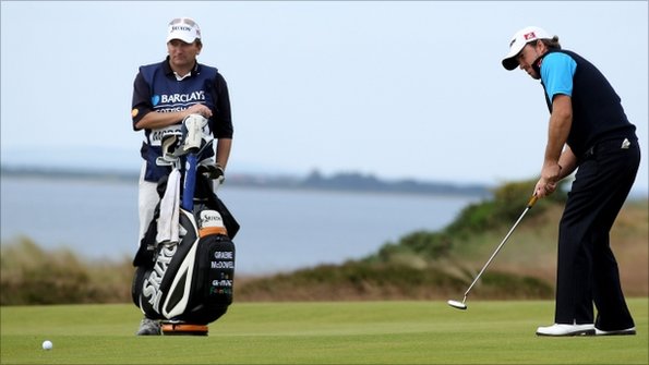 Graeme McDowell practising his putting on a Kentish green.