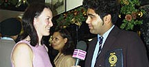 Alison speaks to a member of Indian Rugby team