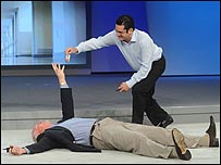 Craig Barrett and person lying on floor playing dead
