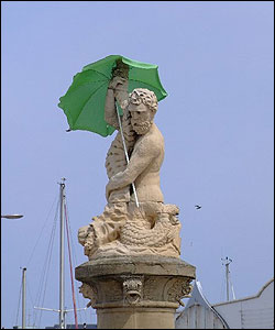 Neptune stutue with umbrella, Lowestoft