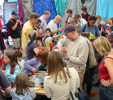 John Walls leads a workshop making strange instruments from scrap materials