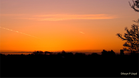 Sunrise over Holywell by Dilwyn Lloyd.