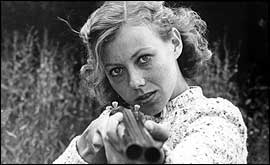 Jenny Agutter holding gun