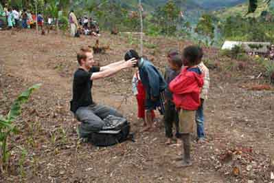 Jody showing the Ranomafana kids the radio equipment .jpg