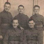 Back Row (L-R) Johnny Johnson (RPs), Jack Smith (Signals), Frank Crockford (Driver) and Front Row (L-R) Ron Harwood (Signals), Lewis Edwards (Signals) photographed at the Whitbread Hop Farm, Paddock Wood, Kent between September 1939 - May 1940; 'B' Company, 1st Bn QVR