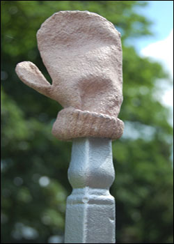 Tracey Emin has cast bronze baby clothes like this