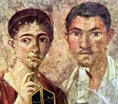 1st-century Roman couple depicted in a wall painting, the woman holding a stylus and the man a scroll
