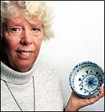 Woman holding 'bleeding bowl'