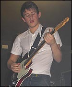 Jamie Cook plays warms up at The Plug