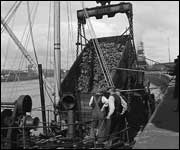 The puffer 'Celt' loading coal at Queen's Dock, Glasgow. Photo courtesy of Calum Pearson