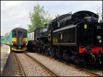 A diesel loco and a stream train