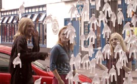 Gender Specific installation of water filled gloves is copyright to th artist Fiona Mathison