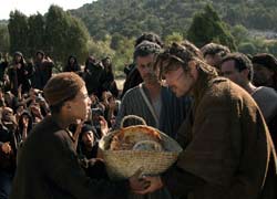 Jesus receiving a basket of bread