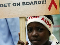 Uma menina do Zimbábue participa de um ato de conscientização da Aids