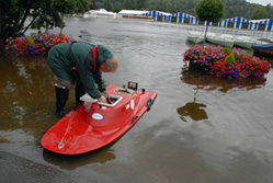 Man with rowboat in 2007 floods