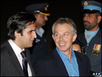 Pakistan State Minister for Foreign Affairs, Khusro Bakhtyar (left) greets Tony Blair (right)