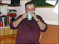 Mike Parr drinking coffee