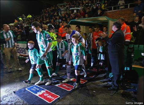Footballers take to the field at Croft Park. Photo: Getty Images