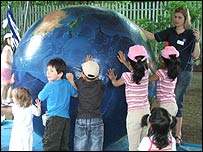Children with a globe
