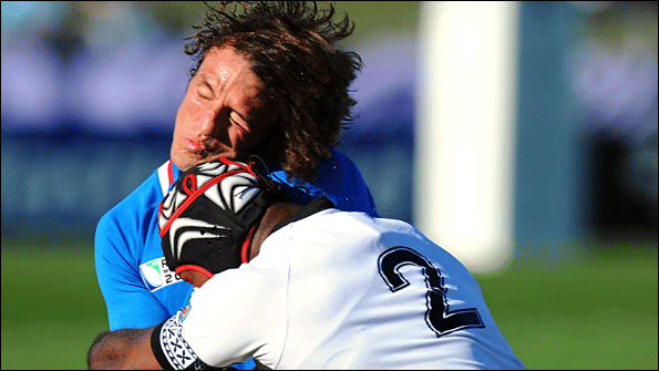 Burger is hit by Viliame Veikoso of Fiji during their World Cup encounter