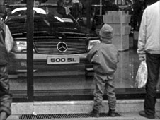 Franz Strasser looks at a Mercedes
