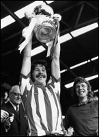 Bobby Kerr lifts the cup