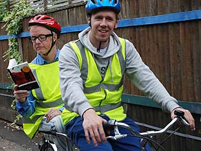 Chris Evans and Jonny Saunders cycling