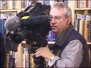 Cameraman Richard Clutterbuck using a modern broadcast camcorder