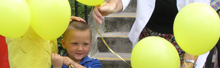 Child and balloons