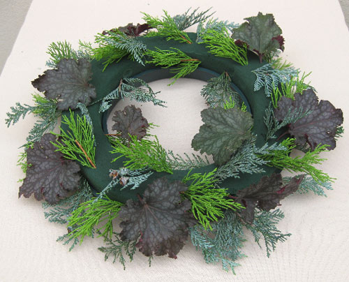 add the heuchera or ivy at different angles