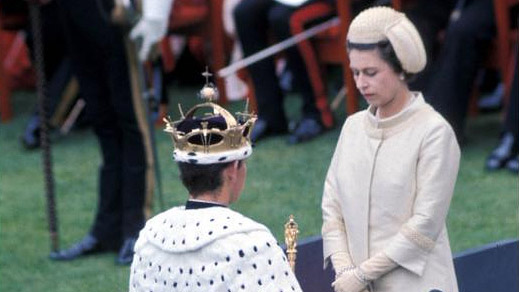 Prince Charles being invested by his mother, Queen Elizabeth ll