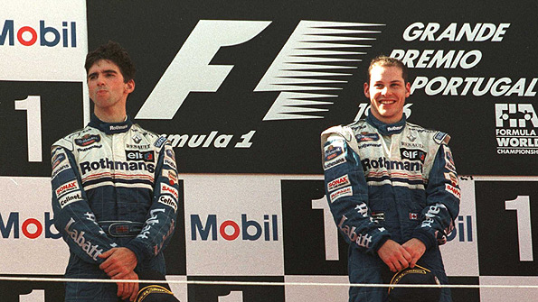 Damon Hill (left) and Jacques Villeneuve on the podium at the 1996 Portuguese Grand Prix