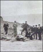 Men at the scene of the riot