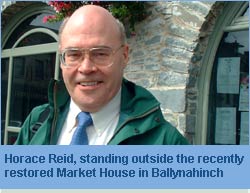 Photo of Horace Reid outside the Market House