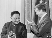 Chinese Vice-Premier Deng Xiaoping (L) shown in a a photo dated 31 January 1979 applauding with US President Jimmy Carter after signing three agreements for Sino-US cooperation in Science and Technology, Culture and Consular Affairs in a ceremony in the East Room of the White House. ARNOLD SACHS/AFP/Getty Images