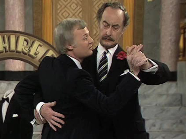 Captain Peacock ballroom dances with Mr Humphries