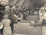Women working the presses, 1940s
