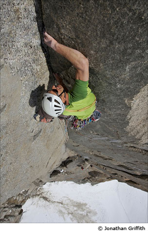 Jon Bracey on the 6c 'finger crack' of the Dam du Lac on the South Face of the Aiguille du Midi. 