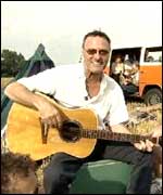 Steve Harley of Cockney Rebel fame playing the guitar 