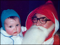 Boy with a disappointing Santa