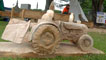 Day 2 - A wooden tractor sculpted using a chainsaw and Simon Hedger's steady hand.