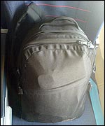 That bulging camera bag