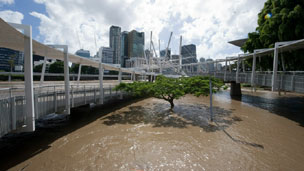 Flood water surrounds Kurilpa bridge in the suburb of South Brisbane on 13 January 2011 in Brisbane, Australia.