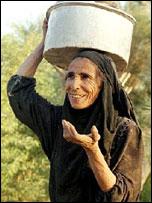woman fetching water