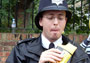 A Policeman Eating Fried Chicken