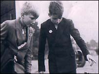 Boys looking at something.... but what?