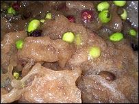 olives in the crusher