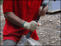 Stonemason cutting stone